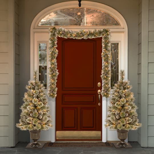 9' x 10" Pre-lit Glittery Bristle® Pine Artificial Christmas Garland with White Tipped Cones and 50 Clear Lights
